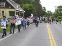Milk with Dignity Scores of dairy farm workers and activists marching in Montpelier, Vt., on Saturday June, 17, 2017. They were marching to the main Ben & Jerry's factory in the Vermont town of Waterbury to protest what they feel are slow negotiations to reach a deal on their "Milk with Dignity" program …