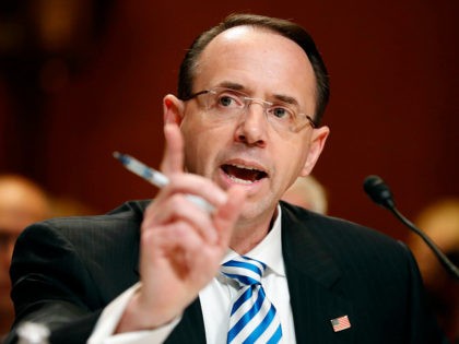 FILE - In this June 13, 2017 file photo, Deputy Attorney General Rod Rosenstein testifies on Capitol Hill in Washington. President Donald Trump confirmed Friday, June 16, 2017, he was under investigation and appeared to take aim at a senior Justice Department official, in a tweet that seemed to encapsulate …