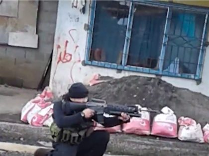 Images previously released by the Islamic State from Marawi showed gunmen patrolling the streets, holding checkpoints, and planting their notorious black banner.