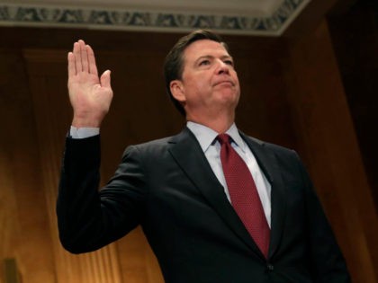FBI Director James Comey is sworn in before a Senate Committee on Homeland Security and Government Affairs hearing on 'Fifteen Years After 9/11: Threats to the Homeland,' on Capitol Hill in Washington, DC on September 27, 2016. / AFP / YURI GRIPAS (Photo credit should read YURI GRIPAS/AFP/Getty Images)