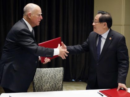 Jerry Brown China agreement (Andy Wong / Associated Press)