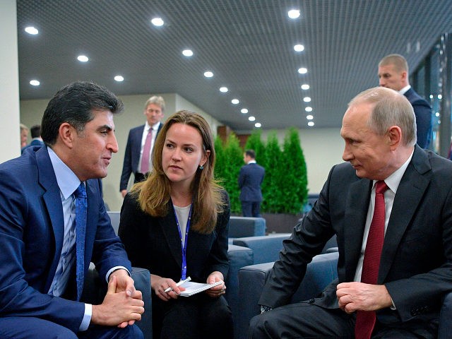 Russian President Vladimir Putin, right, speaks with Prime Minister of Iraq's autonomous K