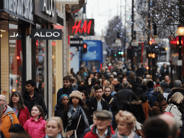 Shoppers make their way down Oxford Street on December 24, 2012 in London, England.
