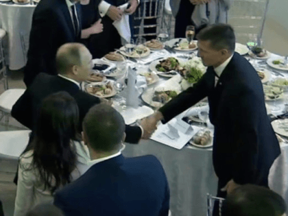 Putin and Flynn meet (Associated Press)