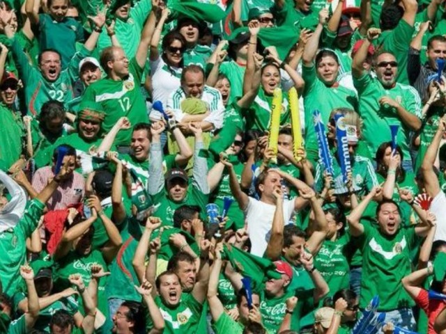 Mexico fans cheer a goal against the United States in a World Cup qualifying match at Esta