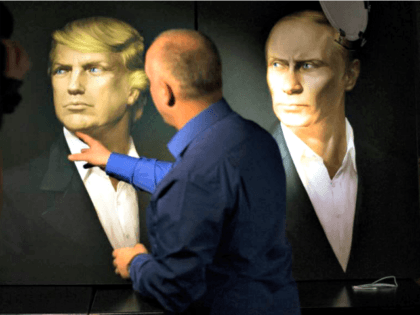Trump, Putin Portraits AP