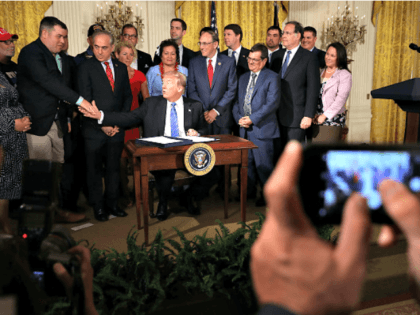 Trump Signs VA Act