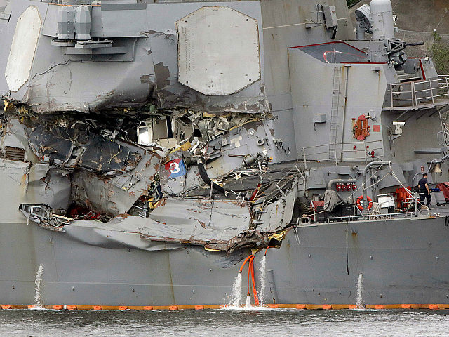 In this June 18, 2017 file photo, damaged section of the USS Fitzgerald is seen at the U.S