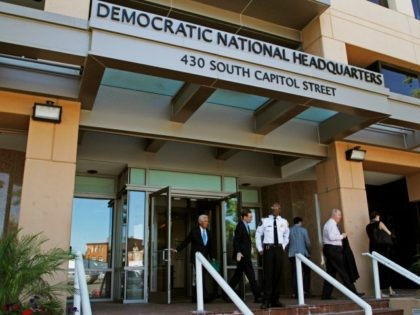 In this June 14, 2016 file photo, people stand outside the Democratic National Committee (