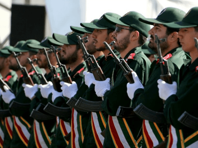 Iranian soldiers from the Revolutionary Guards march march during the annual military para