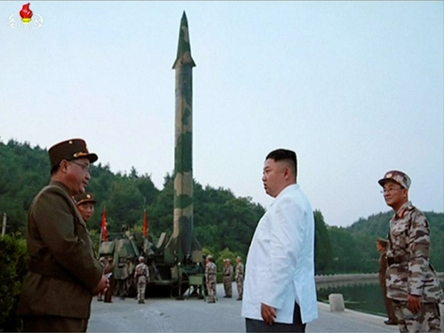 This image, taken from video of an undated still, broadcast by North Korea's KRT newscast on Tuesday, May 30, 2017, shows North Korean leader Kim Jong Un and a rocket launcher in North Korea.  North Korea's state television (KRT) aired video on Tuesday in which Kim appeared to be giving field tours during test firing of a Scud ballistic missile that reportedly took place the previous day.  Independent journalists have not been granted access to cover the event depicted in this photograph.  (KRT via AP video)