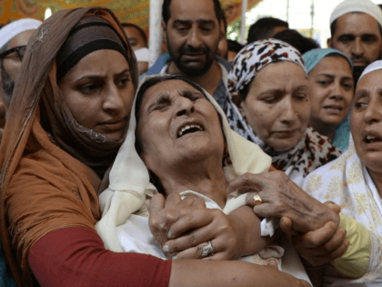 Mohammed Ayub Pandith's relatives mourn his killing. Image credit: Tauseef Mustafa/AFP