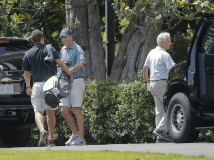 Former NFL football quarterback Peyton Manning, center left, and Sen. Bob Corker, R-Tenn., right, exit vehicles after arriving on the South Lawn of the White House in Washington, Sunday, June 4, 2017. Corker and Manning were in President Donald Trump's motorcade which was returning from Trump National Golf Club in …