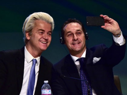 Dutch far-right Freedom Party leader Geert Wilders (L) takes a selfie with Heinz Christian Strache of the Freiheitliche Partei Osterreichs (FPO) during a press conference at the end of the first ENF (Europe of Nations and Freedom) congress in Milan on January 29, 2016. / AFP / GIUSEPPE CACACE (Photo …