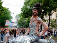 rsz_GettyImages-696950466 Participants of the 'Regenbogenparade' (Rainbow Parade) march in Vienna, Austria, are pictured on June 17, 2017. Lesbian, gay, bisexual, transgender and transsexual people attended the parade in the Austrian capital. / AFP PHOTO / ALEX HALADA (Photo credit should read ALEX HALADA/AFP/Getty Images)