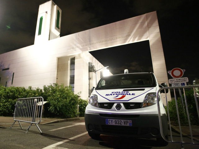 A police vehicle is stationed outside a mosque June 29, 2017 in the Paris suburb of Creteil after a man tried to drive a car into a crowd in front of the Islamic religious facility. The man has been arrested by police who said that due to protective barriers outside …