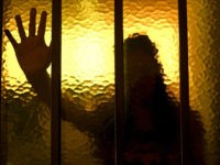 silhouette-girl-behind-bars-window-human-trafficking-ap In this Dec. 16, 2016 photo, an alleged victim of priest Nicola Corradi poses for a photo during an interview in Mendoza, Argentina. At least 24 students of the Antonio Provolo Institute in Argentina have now come forward seeking justice for the abuse they say they suffered at the hands …