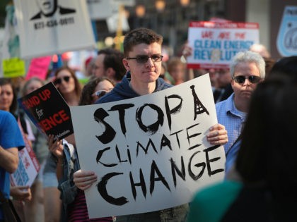 CHICAGO, IL - JUNE 02: Demonstrators protest President Donald Trump's decision to exit the