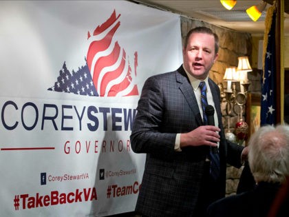 Republican candidate for Governor of Virginia, Corey Stewart, gestures at a campaign kickoff rally at a resturaunt in Occoquan, Va., Monday, Jan. 23, 2017. (AP Photo/Steve Helber)