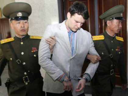 FILE - In this March 16, 2016, file photo, American student Otto Warmbier, center, is escorted at the Supreme Court in Pyongyang, North Korea. Warmbier, whose parents say has been in a coma while serving a 15-year prison term in North Korea, was released and returned to the United States …
