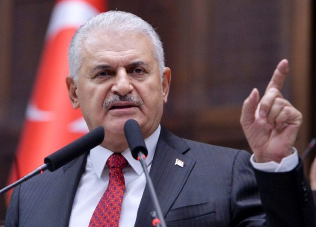 Turkish Prime Minister Binali Yildirim delivers a speech during the AK Party's group meeti