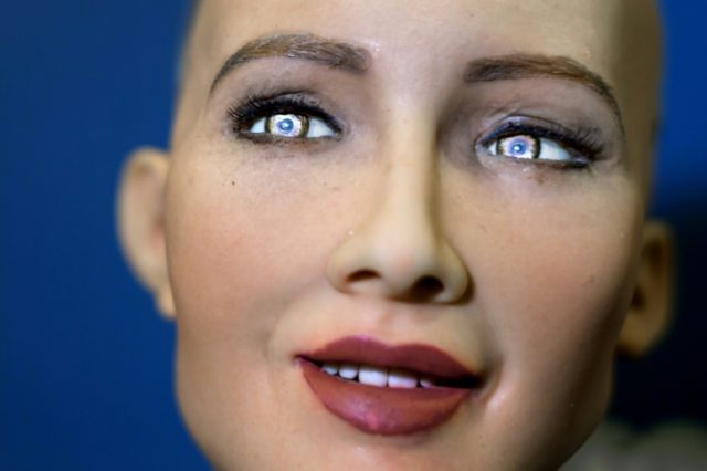 Sophia, a humanoid robot, is the main attraction at a conference on artificial intelligenc