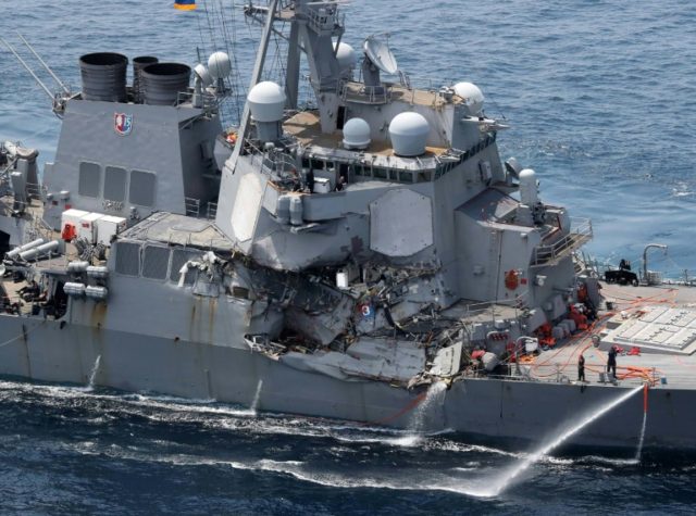 Damage is seen on the guided missile destroyer USS Fitzgerald off Japan's coast, after it