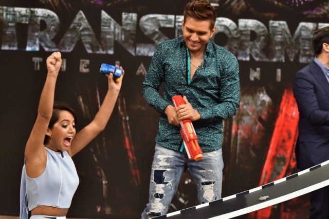 Isabela Moner and El Dasa, seen on the set of 'Despierta America' to promote the film 'Tra