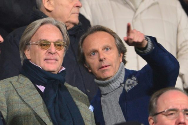 Fiorentina owners Diego (L) and Andrea Della Valle watch the Italian Serie A match against