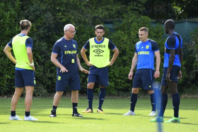 FC Nantes' new Italian coach Claudio Ranieri (2-L) speaks to players during a training ses