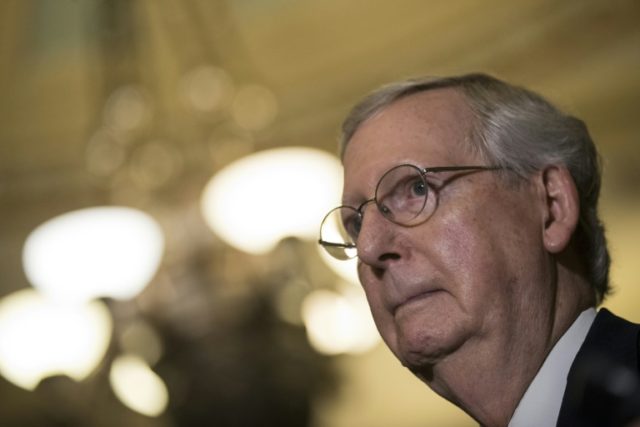 With internal dissent swelling, Senate Majority Leader Mitch McConnell Tuesday postponed a