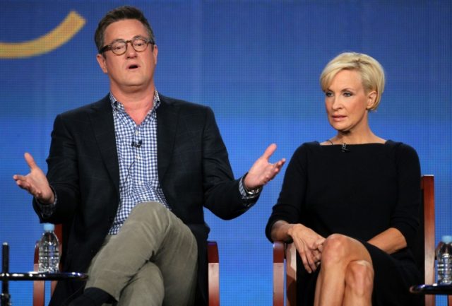 Joe Scarborough and co-host Mika Brzezinski on a 'Morning Joe' discussion panel in 2012