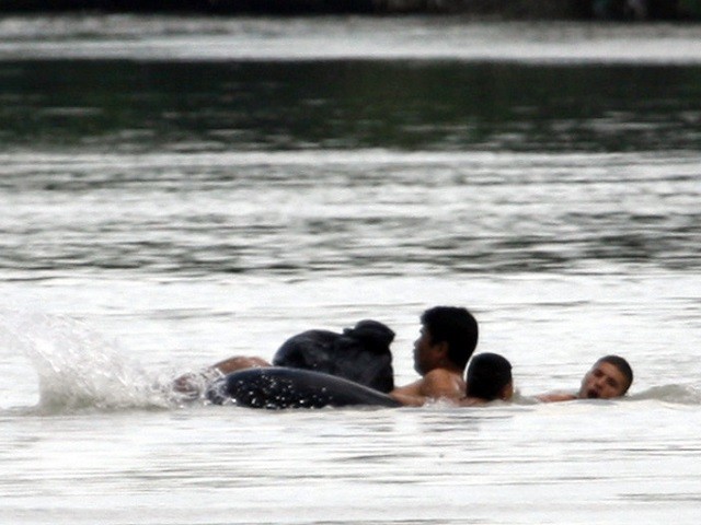 Infant Migrant Drowns After Smuggler's Raft Capsizes in Texas Border River