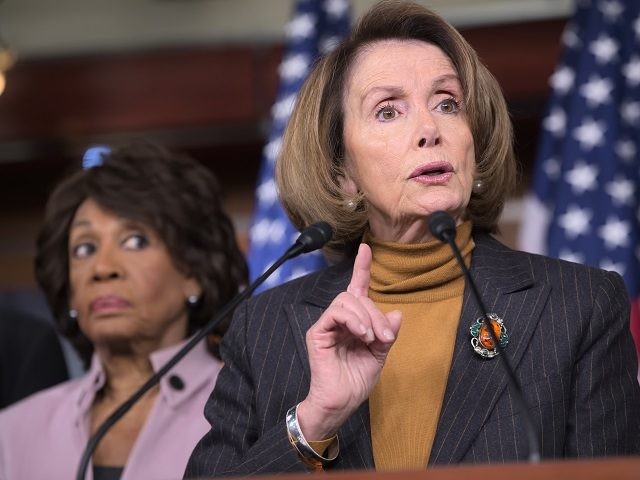 House Minority Leader Nancy Pelosi of Calif., joined by Rep. Maxine Waters, D-Calif., criticizes President Donald Trump's pro-Wall Street policies during a news conference on Capitol Hill in Washington, Monday, Feb. 6, 2017. (AP Photo/J. Scott Applewhite)