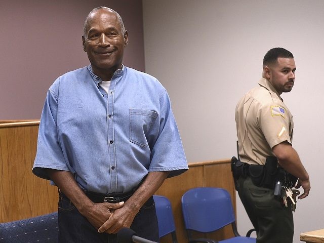 Former NFL football star O.J. Simpson enters for his parole hearing at the Lovelock Correc