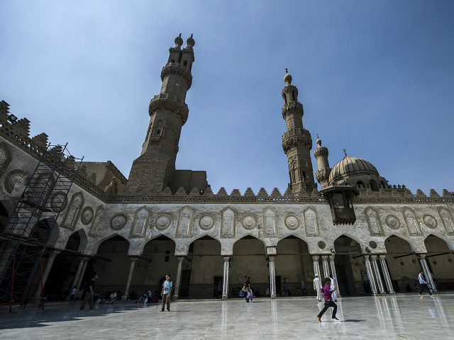 An Egyptian boy plays at al-Azhar mosque following the Friday weekly prayer in the capital