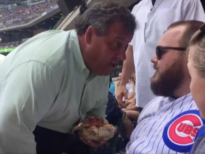 New Jersey Gov. Chris Christie got up close and personal with a Chicago Cubs fan Sunday, c