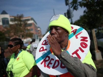 WASHINGTON, DC - SEPTEMBER 27: Protesters gather outside of Fannie Mae headquarters Septe