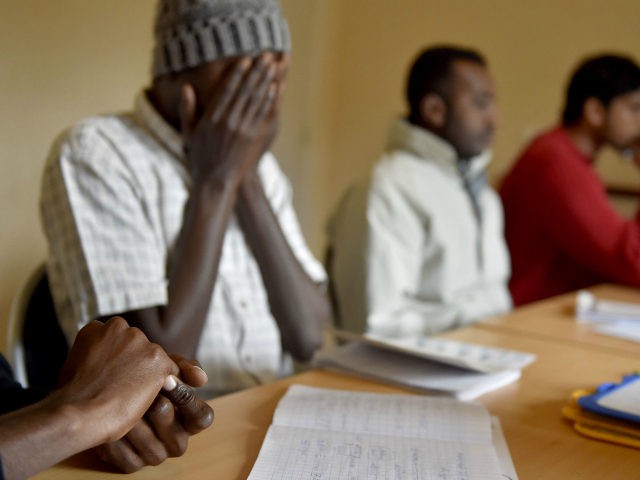 Migrants attend a French lesson given by volunteers at a 'Centre dAccueil et dOrientation pour migrants' (CAO - Reception and Orientation Center for Migrants) in Saint-Brevin-les-Pins, western France, on January 4, 2017. Volunteers in Saint-Brevin-les-Pins are helping 47 migrants coming from the recently-demolished 'Jungle' migrant camp in Calais, giving them …