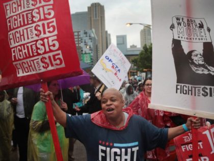 CHICAGO, IL - MAY 23: Demonstrators fighting for a $15-per-hour minimum wage march through downtown during rush hour on May 23, 2017 in Chicago, Illinois. The march was held to coincide with McDonald's shareholders meeting which will be held tomorrow in nearby Oak Brook. (Photo by Scott Olson/Getty Images)