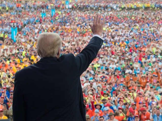 US President Donald Trump waves after speaking to Boy Scouts during the National Boy Scout