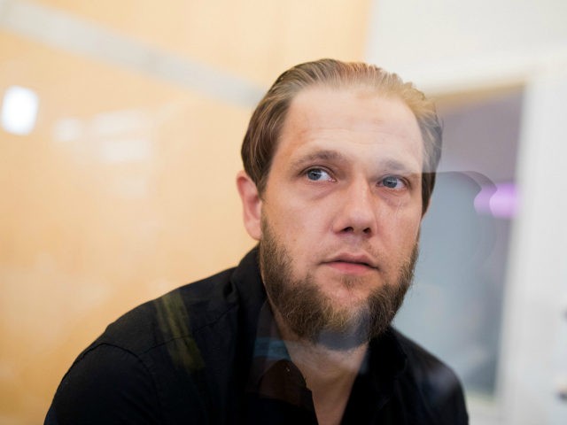Defendant Islamist Sven Lau stands in the courtroom in Duesseldorf, western Germany, on Ju