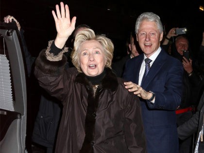 Former Secretary of State Hillary Clinton and former President Bill Clinton attend the Broadway a cappella musical "In Transit", at Circle in the Square Theatre, on Wednesday, Feb.1, 2017, in New York. (Photo by Greg Allen/Invision/AP)