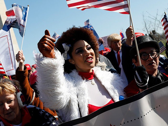 WASHINGTON, DC - MARCH 4: Singer Joy Villa joins demonstrators near the Washington Monumen
