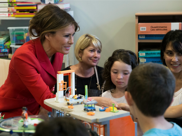 First Lady Melania Trump talks to children as she visits the Necker hospital, France'
