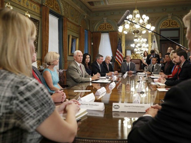 Vice President Mike Pence, left center, speaks to a group of grassroots organizations call