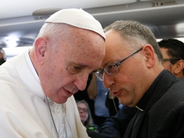 Pope Francis talks with Jesuit Father Antonio Spadaro, editor of La Civilta Cattolica, while meeting journalists aboard his flight to Havana Feb. 12. Traveling to Mexico for a six-day visit, the pope is stopping briefly in Cuba to meet with Russian Orthodox Patriarch Kirill of Moscow at the Havana airport. …