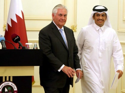 US Secretary of State Rex Tillerson and Qatari Foreign Minister Sheikh Mohammed bin Abdulrahman Al-Thani leave the stage following a press conference in Doha, on July 11, 2017. The US and Qatar announced they have signed an agreement on fighting terrorism, at a time when the emirate is facing sanctions …