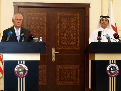 US Secretary of State Rex Tillerson and Qatari Foreign Minister Sheikh Mohammed bin Abdulrahman Al-Thani listen to questions by journalists during a press conference in Doha, on July 11, 2017. The US and Qatar announced they have signed an agreement on fighting terrorism, at a time when the emirate is …