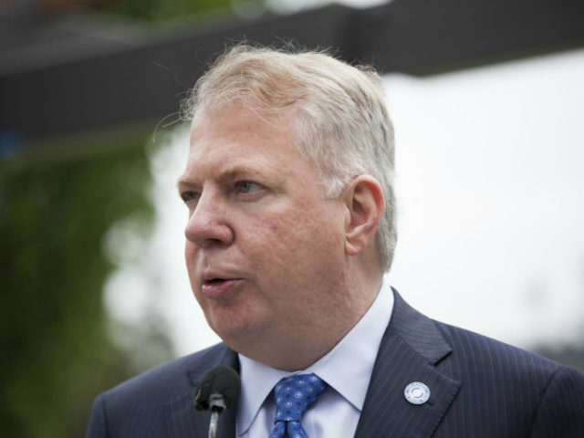 Seattle Mayor Ed Murray holds a press conference after signing a bill that raises the city